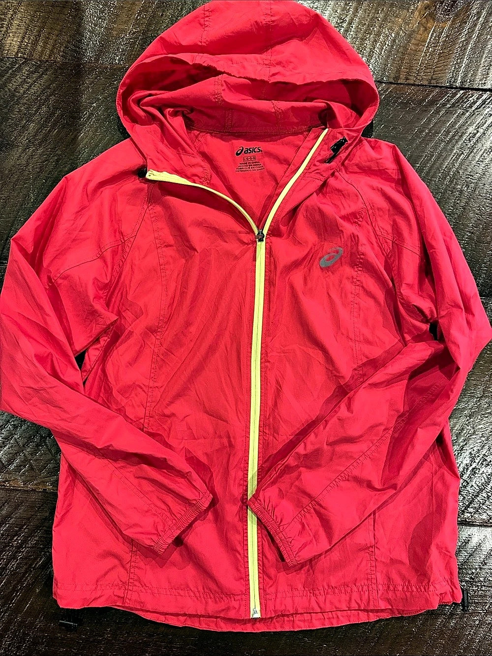 ASICS Women's Hooded Windbreaker in Pink